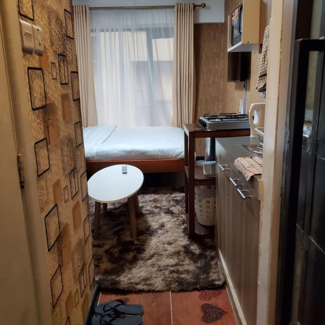 Lovely & Cozy Compact Studio Near Airport With Rooftop View Leilighet Nairobi Eksteriør bilde