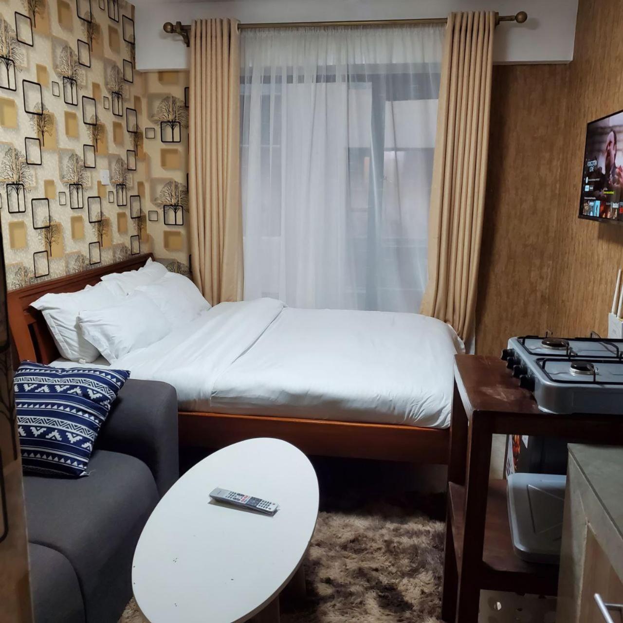 Lovely & Cozy Compact Studio Near Airport With Rooftop View Leilighet Nairobi Eksteriør bilde